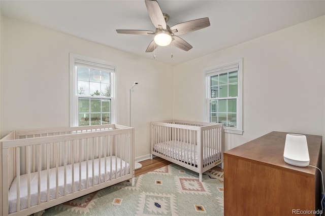860 Magnolia St, Denver, CO 80220 - bedroom with wood finished floors and ceiling fan