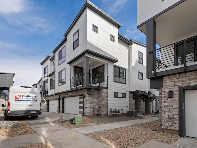 2032 S Holly St Unit 3, Denver, CO 80222 - view of building exterior with an attached garage