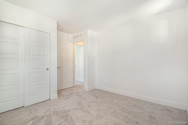2032 S Holly St Unit 3, Denver, CO 80222 - unfurnished bedroom featuring carpet floors and a closet