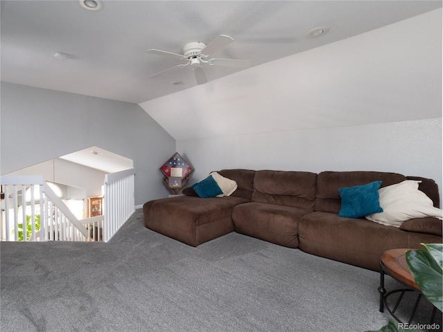 living room featuring lofted ceiling, carpet flooring, and ceiling fan