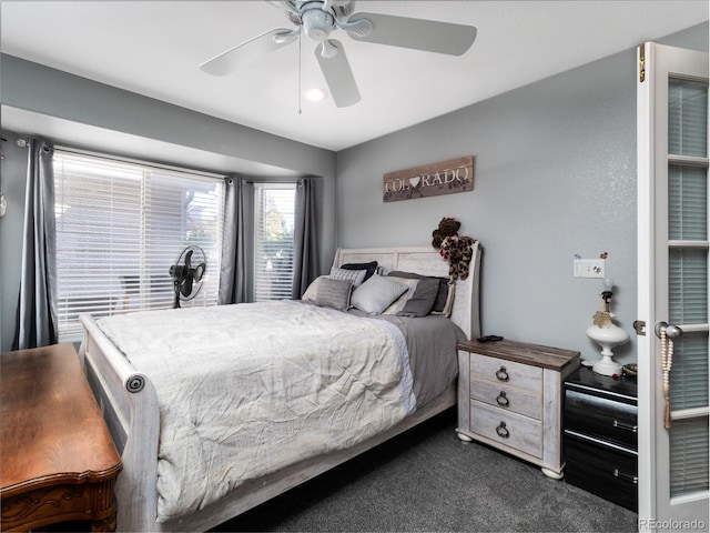 carpeted bedroom with ceiling fan