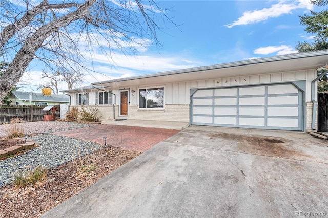 ranch-style home with a garage