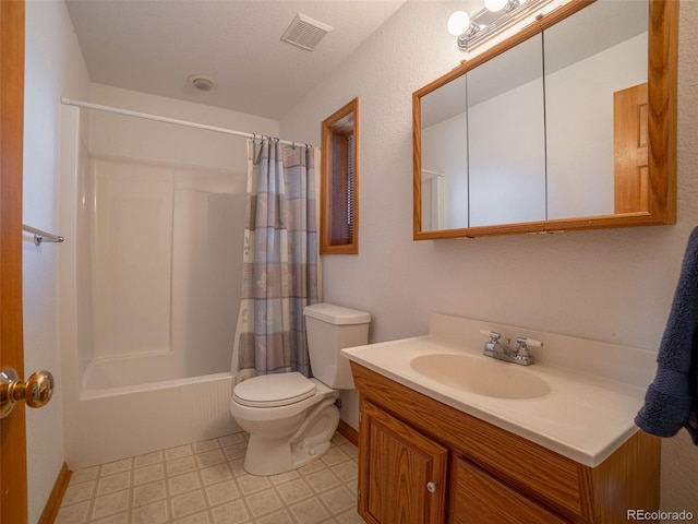 full bathroom featuring shower / tub combo with curtain, vanity, and toilet