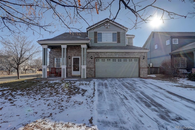 view of front of home with a garage