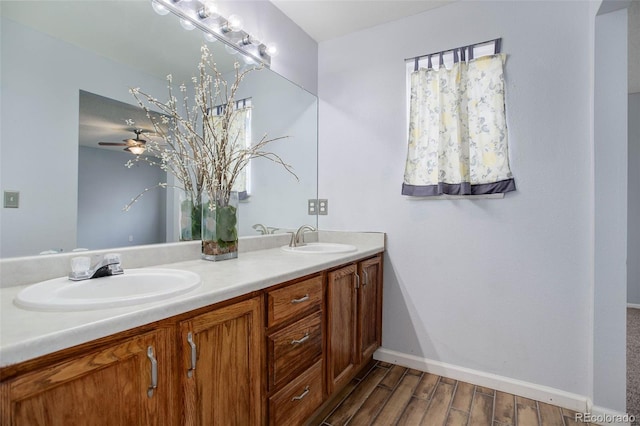 bathroom featuring wood-type flooring and vanity