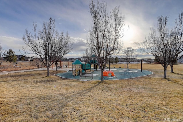 view of jungle gym with a lawn