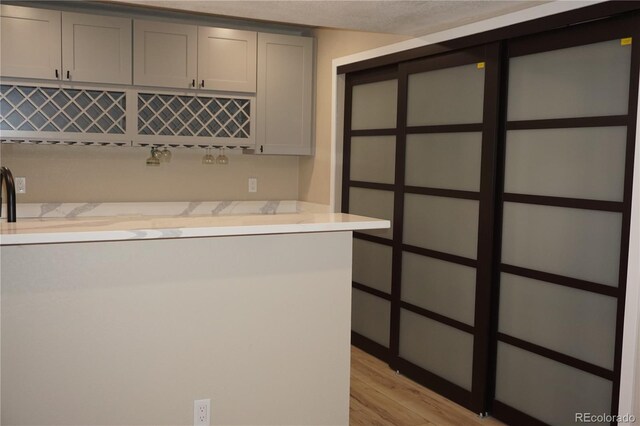 20630 E Hamilton Ave, Aurora, CO 80013 - bar area with light wood-style floors