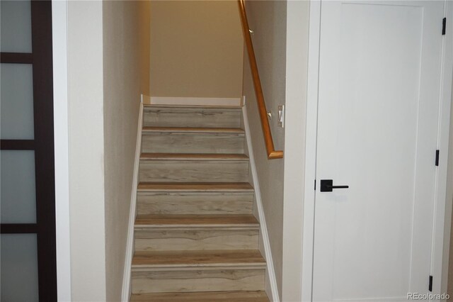 20630 E Hamilton Ave, Aurora, CO 80013 - stairway featuring wood finished floors