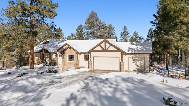 view of front of property with a garage