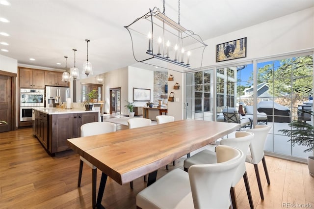 dining room featuring light wood-type flooring