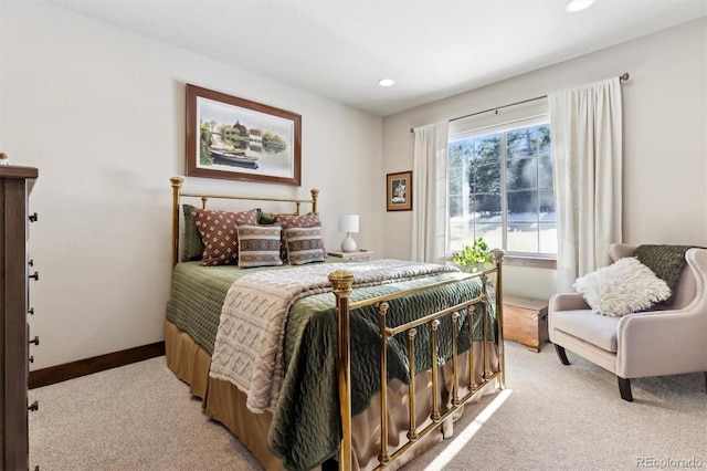 bedroom featuring light colored carpet