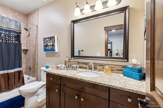 full bathroom featuring toilet, shower / bath combination with curtain, and vanity