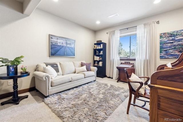 living room featuring light colored carpet