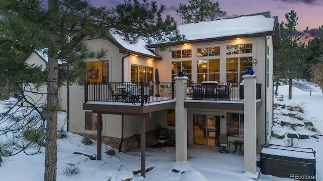 view of snow covered house