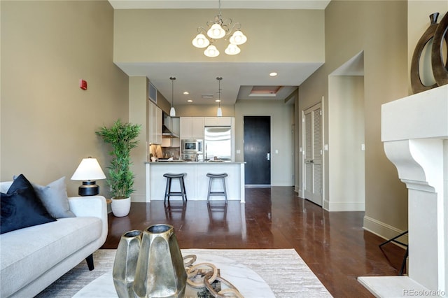 5455 Landmark Pl Unit 1403, Greenwood Village, CO 80111 - living room featuring baseboards, dark wood-style flooring, and recessed lighting