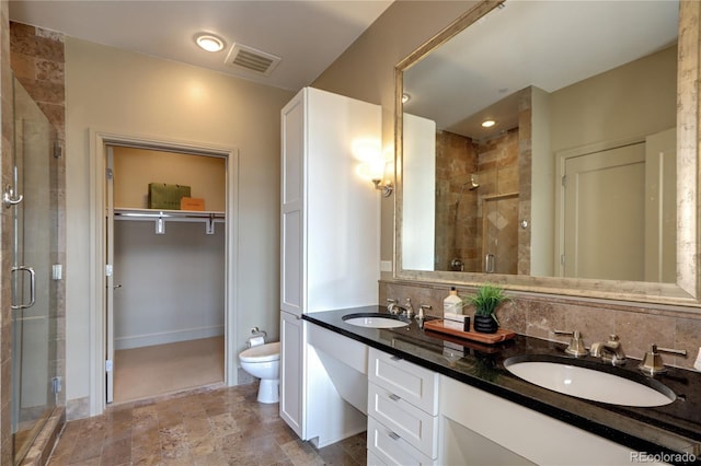5455 Landmark Pl Unit 1403, Greenwood Village, CO 80111 - full bath with a shower stall, double vanity, toilet, and decorative backsplash
