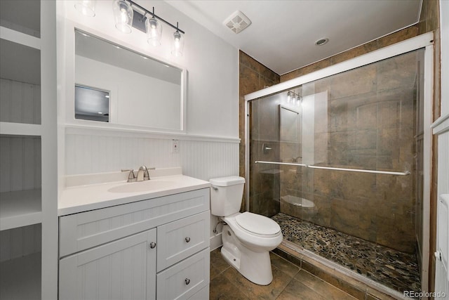 3324 W Hialeah Ave, Littleton, CO 80123 - full bath with vanity, a shower stall, and wainscoting