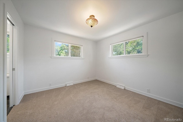 3324 W Hialeah Ave, Littleton, CO 80123 - carpeted empty room featuring healthy amount of natural light