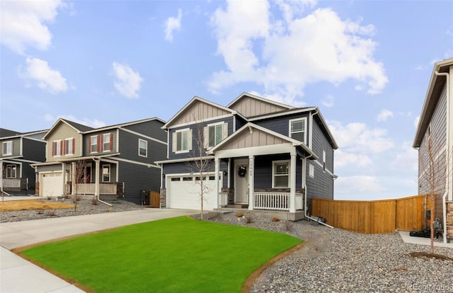 view of front of property with fence, a porch, an attached garage, concrete driveway, and board and batten siding