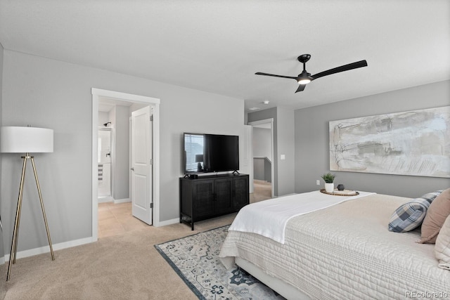 bedroom with light carpet, a ceiling fan, and baseboards