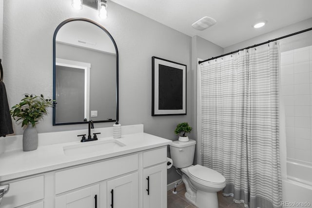 bathroom featuring tile patterned floors, visible vents, toilet, shower / tub combo with curtain, and vanity