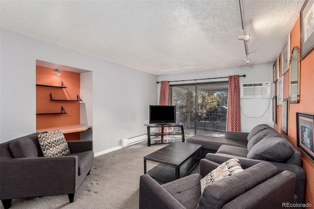 living room with rail lighting, a textured ceiling, a wall unit AC, a baseboard heating unit, and carpet floors