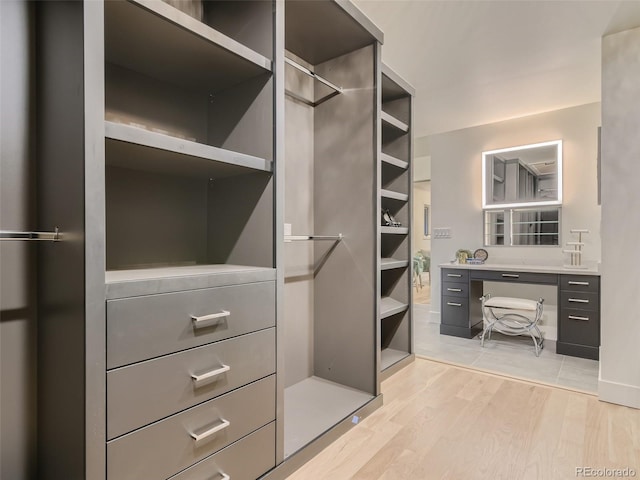 spacious closet with light wood-type flooring