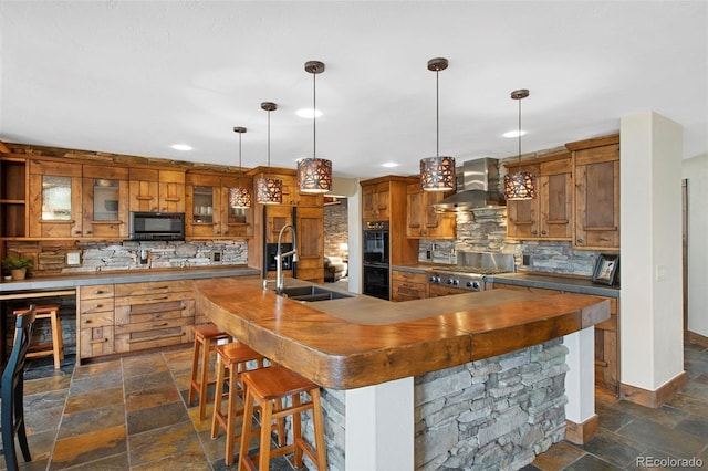 34 Amaranth Dr, Littleton, CO 80127 - kitchen featuring brown cabinetry, black appliances, wall chimney exhaust hood, and a sink