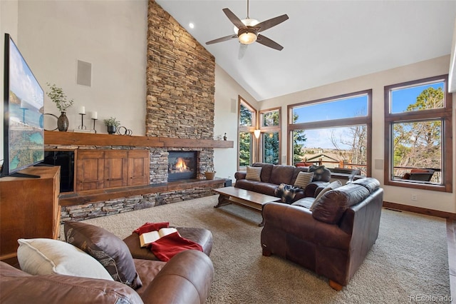 34 Amaranth Dr, Littleton, CO 80127 - living room featuring a ceiling fan, a stone fireplace, high vaulted ceiling, and a healthy amount of sunlight