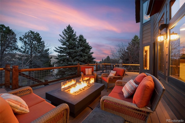 34 Amaranth Dr, Littleton, CO 80127 - wooden deck with an outdoor living space with a fire pit