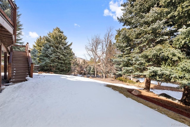 34 Amaranth Dr, Littleton, CO 80127 - yard layered in snow with stairs
