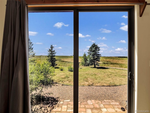 5549 Yulle Rd, Bennett, CO 80102 - doorway with a view of countryside and plenty of natural light