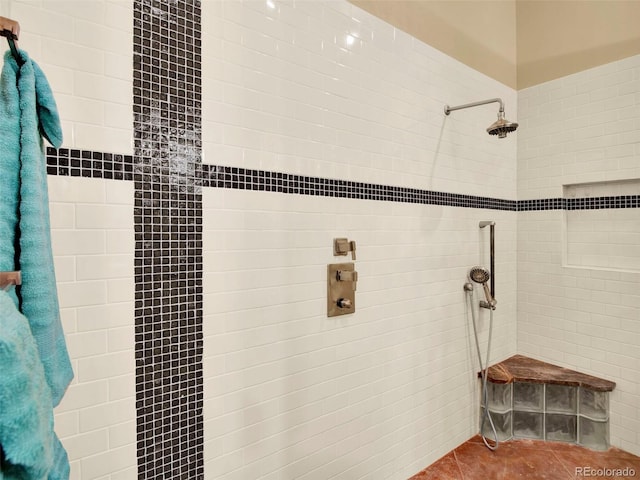 5549 Yulle Rd, Bennett, CO 80102 - full bath featuring tiled shower and tile patterned flooring