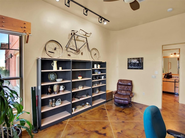 5549 Yulle Rd, Bennett, CO 80102 - sitting room with ceiling fan, tile patterned flooring, and track lighting