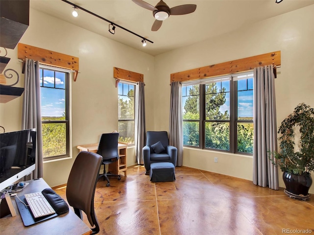 5549 Yulle Rd, Bennett, CO 80102 - office space with rail lighting, concrete flooring, and a ceiling fan