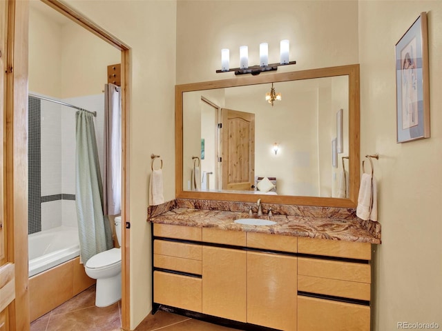 5549 Yulle Rd, Bennett, CO 80102 - full bath featuring tile patterned floors, shower / bath combo with shower curtain, vanity, and a chandelier