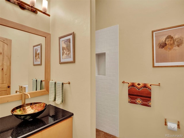 5549 Yulle Rd, Bennett, CO 80102 - bathroom featuring vanity and tile patterned flooring