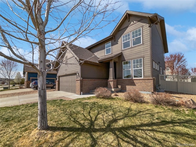 1826 Sunshine Ave, Longmont, CO 80504 - view of front of home with brick siding, driveway, and an attached garage