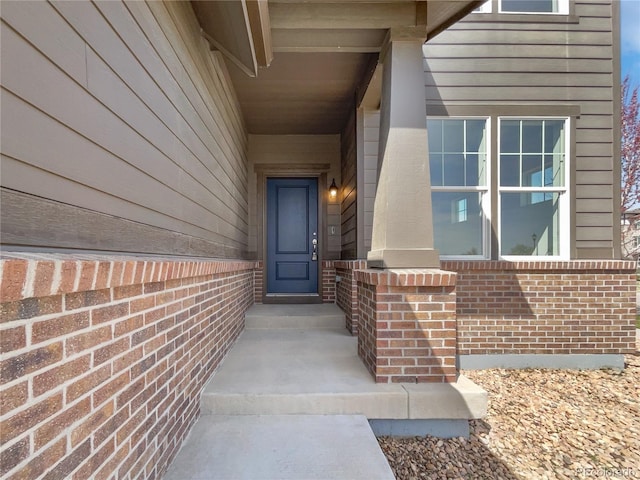 1826 Sunshine Ave, Longmont, CO 80504 - property entrance with brick siding