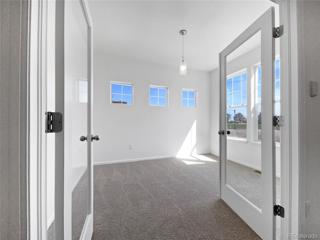 1826 Sunshine Ave, Longmont, CO 80504 - carpeted empty room featuring french doors and baseboards
