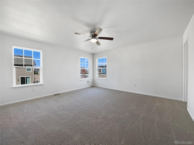 1826 Sunshine Ave, Longmont, CO 80504 - empty room featuring a ceiling fan, carpet, and baseboards