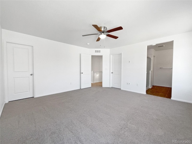 1826 Sunshine Ave, Longmont, CO 80504 - unfurnished bedroom with carpet floors, baseboards, ceiling fan, and ensuite bath