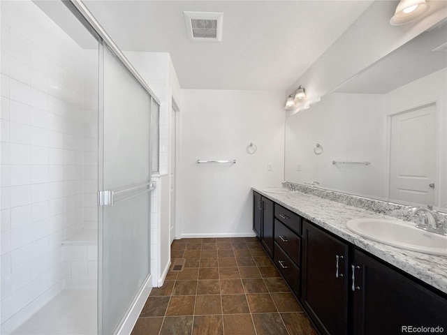 1826 Sunshine Ave, Longmont, CO 80504 - bathroom with double vanity, a shower stall, and baseboards