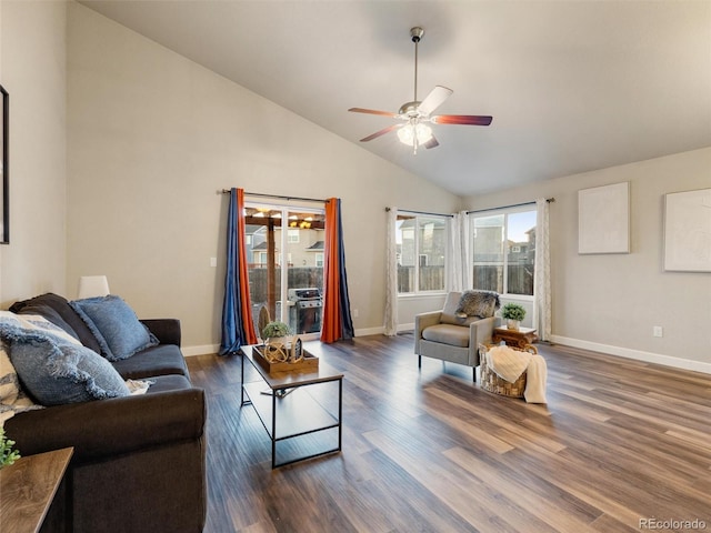 living area featuring high vaulted ceiling, wood finished floors, a ceiling fan, and baseboards