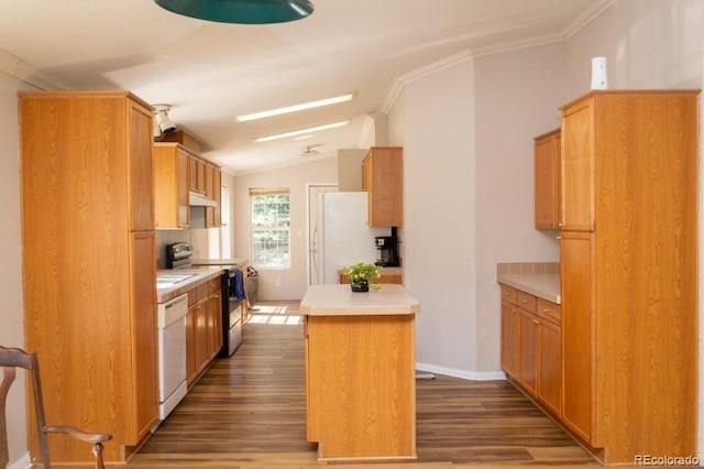 kitchen with dark hardwood / wood-style flooring, lofted ceiling, a kitchen island, and white appliances