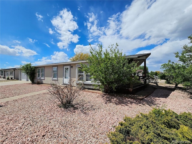 401 Gateway Ave, Fort Morgan, CO 80701 - view of front of property with a garage and stucco siding