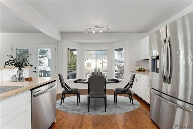 dining room featuring dark wood-type flooring