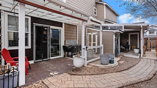 view of patio / terrace with fence and grilling area