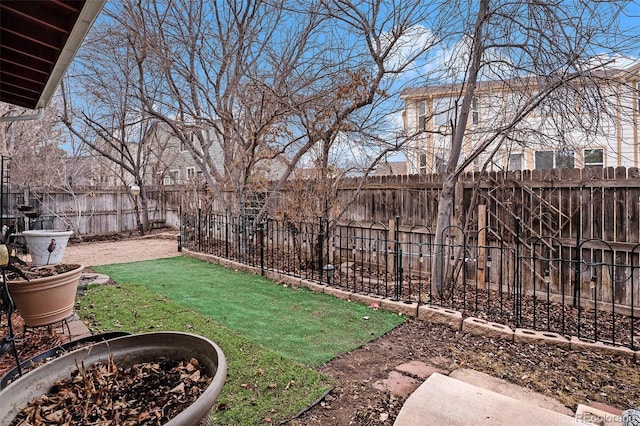 view of yard featuring a fenced backyard