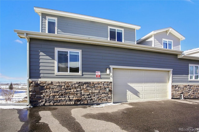 view of front of property featuring a garage